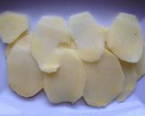 Foto del paso 5 de la receta: Milhojas de patata panadera y calamares