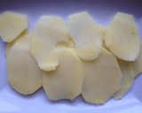 Foto del paso 5 de la receta: Milhojas de patata panadera y calamares