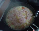 Foto del paso 4 de la receta: Paella de pollo, verduras y atún