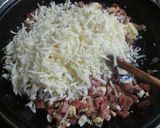 Foto del paso 4 de la receta: Tartita rellena de salchichas de viena y queso