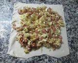 Foto del paso 5 de la receta: Tartita rellena de salchichas de viena y queso