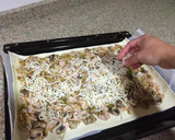 Foto del paso 5 de la receta: Empanada de puerros, champiñones y jamón