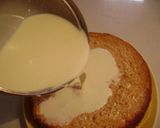 A picture of step 6 of Colombian Tres Leches Cake Decorated with Strawberries.