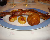 Foto del paso 5 de la receta: Cabrito asado al horno, con patatitas y manzanas