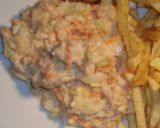 Foto del paso 7 de la receta: Pollo frito con puré de papas, ensalada de col y mazorcas de maíz