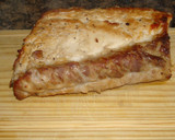 Foto del paso 4 de la receta: Lomo de cerdo asado a la pimienta verde y cava