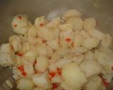 A picture of step 4 of Potatoes with Scrambled Eggs.