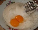 A picture of step 2 of Cauliflower Dipped in Egg.