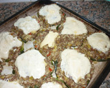 Foto del paso 6 de la receta: Zapallitos rellenos de carne y arroz
