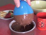 Semi-esfera de chocolate rellena de helado
