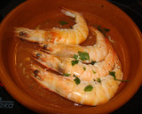 Foto del paso 4 de la receta: Pollo al horno con langostinos al cava