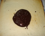 Foto del paso 7 de la receta: Arrollado de pionono con puro chocolate y nueces