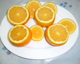 Foto del paso 1 de la receta: Naranjas en almíbar rellenas de crema