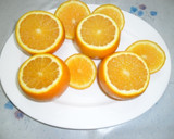 Foto del paso 1 de la receta: Naranjas en almíbar rellenas de crema