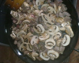 Foto del paso 3 de la receta: Arroz con lagartito iberico y champiñones
