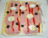 Foto del paso 4 de la receta: Arrollado de pionono con jamón y queso