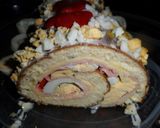 Foto del paso 12 de la receta: Arrollado de pionono con jamón y queso