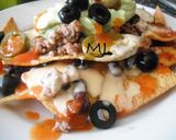 A picture of step 8 of Nachos with Beef.