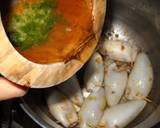 Foto del paso 4 de la receta Calamares rellenos de piñones y huevo
