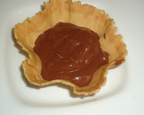 Foto del paso 6 de la receta: Tulipas rellenas con chocolate frutas en almibar y nata