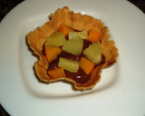 Foto del paso 7 de la receta: Tulipas rellenas con chocolate frutas en almibar y nata