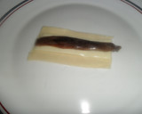 Foto del paso 2 de la receta: Palitos de queso y anchoa