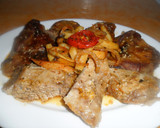 Foto del paso 5 de la receta: Secreto de cerdo al ajo y limón con papas picantes