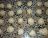 Foto del paso 4 de la receta: Bollitos de limón rellenos con coco y dulce de leche