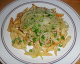 Foto del paso 5 de la receta: Patatas, guisantes y aros de cebolla fritos