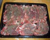 Foto del paso 4 de la receta: Chuletas de cerdo y patatas a las especias