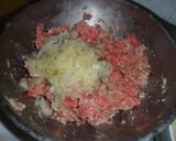A picture of step 2 of Homemade Breaded and Fried Meatballs.