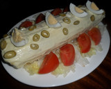 Foto del paso 4 de la receta: Arrollado de pionono relleno de quesos, palta y huevos con mayonesa al limón