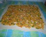 Foto del paso 10 de la receta: Arrollado de hojaldre relleno de choclo entero