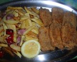 Foto del paso 5 de la receta: Marineras de peceto a la pimienta y orégano con papas fritas