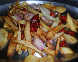 Foto del paso 5 de la receta: Patatas, pimientos y ajos fritos