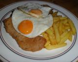 Foto del paso 7 de la receta: Milanesa a caballo con papas fritas