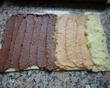 Foto del paso 3 de la receta: Rollitos de hojaldre rellenos de crema pastelera de chocolate y dulce de leche