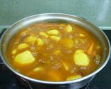 A picture of step 4 of Rioja-Style Potatoes with Chorizo and Marinated Pork Ribs.