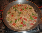 Foto del paso 6 de la receta: Paella de calamares con su tinta