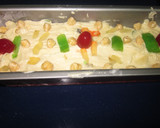 Foto del paso 2 de la receta: Bizcocho de fruta escarchada, pasas y guindas