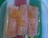 Foto del paso 2 de la receta: Rollitos de jamón con manzana, papaya y jarabe de mandarina