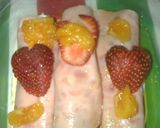 Foto del paso 3 de la receta: Rollitos de jamón con manzana, papaya y jarabe de mandarina