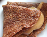 Foto del paso 4 de la receta: Panqueques de chocolate relleno de dulce de leche y crema