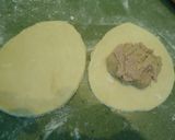 Foto del paso 3 de la receta: Redonditos de hojaldre de jamón y queso