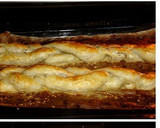Foto del paso 5 de la receta: Trenzas de hojaldre rellenas de jamón champiñones y pasas