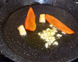 Foto del paso 3 de la receta: Timbal de fideuá con bacalao y espinacas