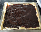 Foto del paso 5 de la receta: Hojaldre de natillas y chocolate