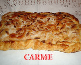 Foto del paso 5 de la receta: Coca de hojaldre con crema, almendras y piñones