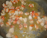 Foto del paso 3 de la receta: Arroz con langostinos, almejas y vieiras
