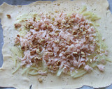 Foto del paso 3 de la receta: Hojaldrado de jamón, quesos y nueces